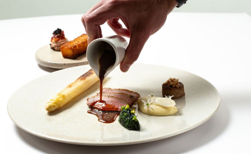 Meat dish with vegetables and gravy at Olive Tree Bath